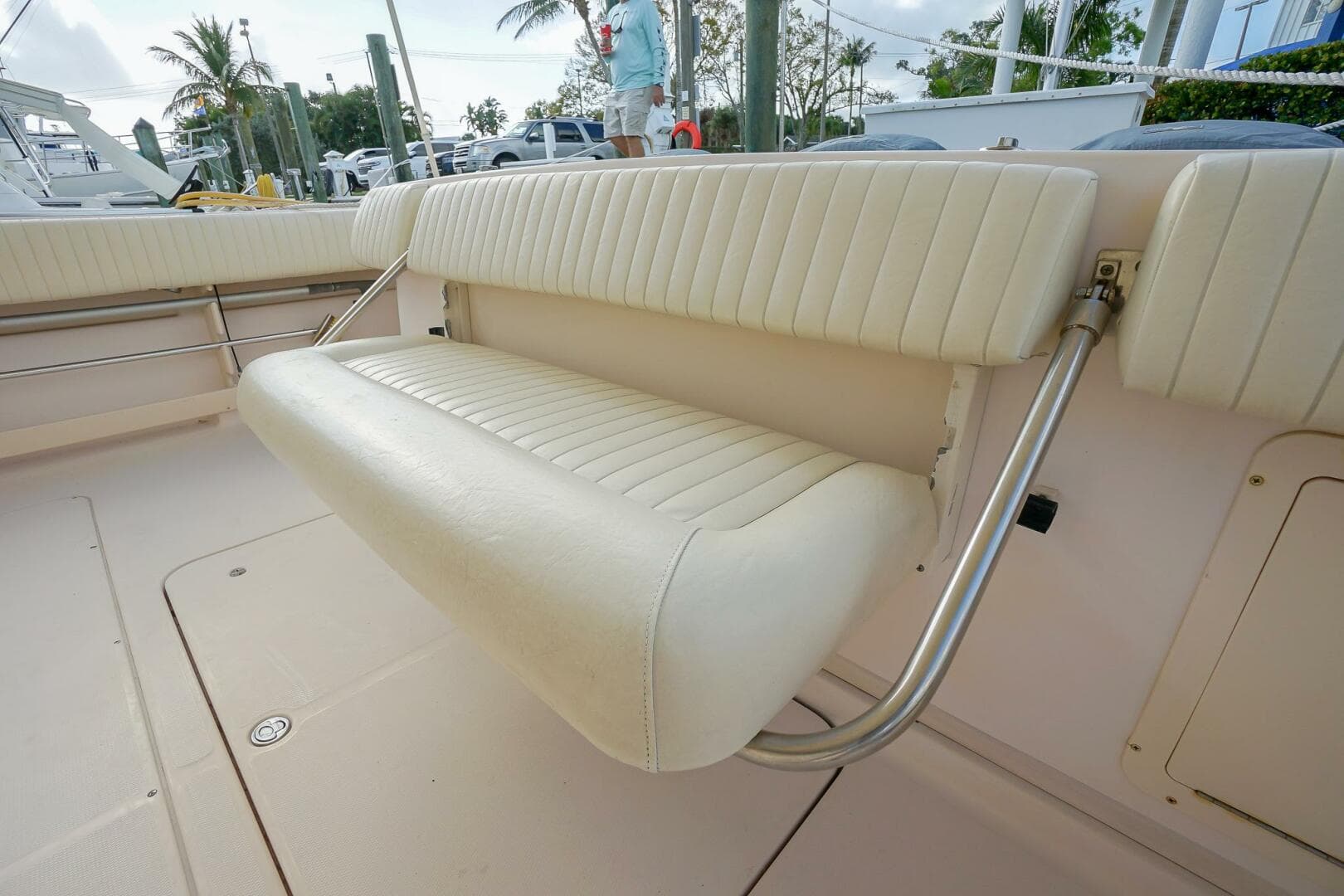 2007 Grady-White Express 360 boat with white cushioned seating in the deck area.