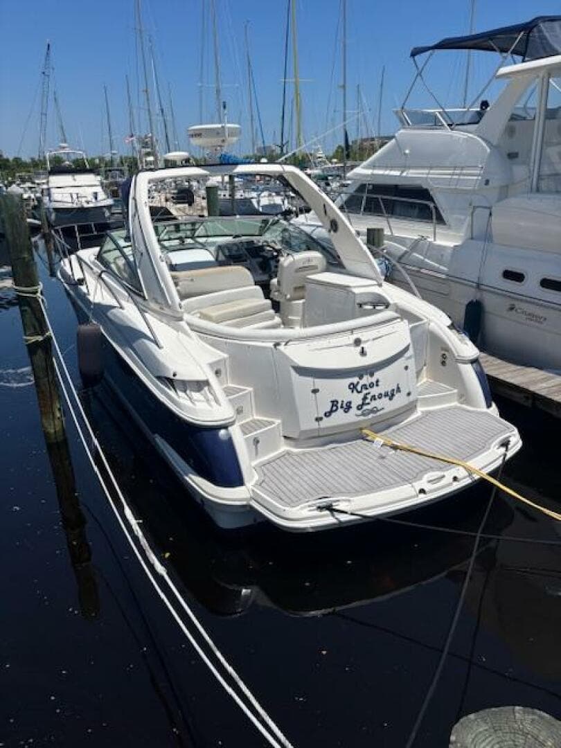 2007 Monterey 350 Sport Yacht docked at marina, sunny day, rear view.