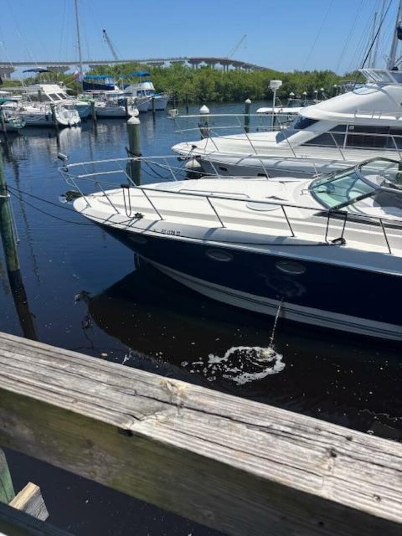 2007 Monterey 350 Sport Yacht docked in a marina with other boats.