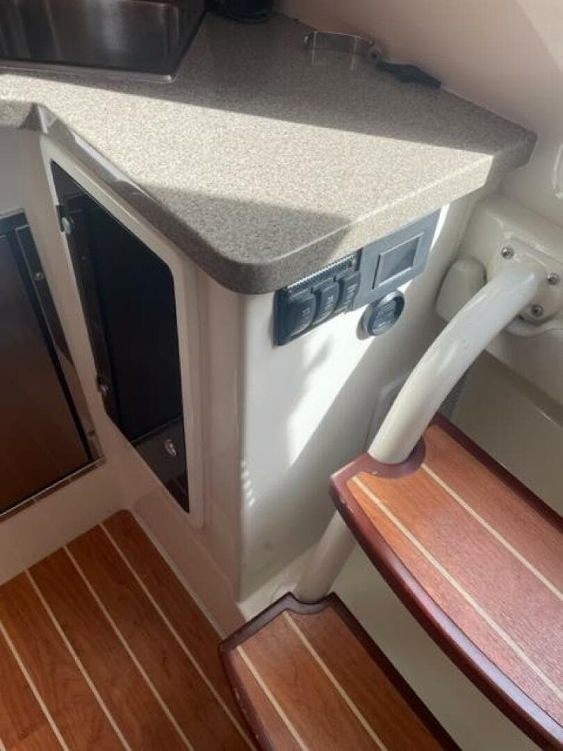 Interior of 2018 Regulator 41 boat with wooden steps and countertop.