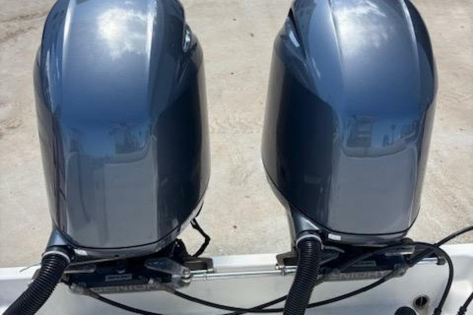 Twin outboard motors on a 2018 Century 2600 Center Console boat.