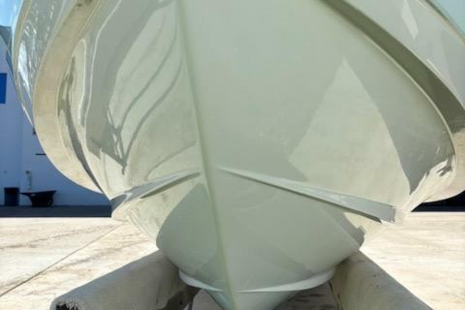 2018 Century 2600 Center Console boat hull on trailer, close-up view.