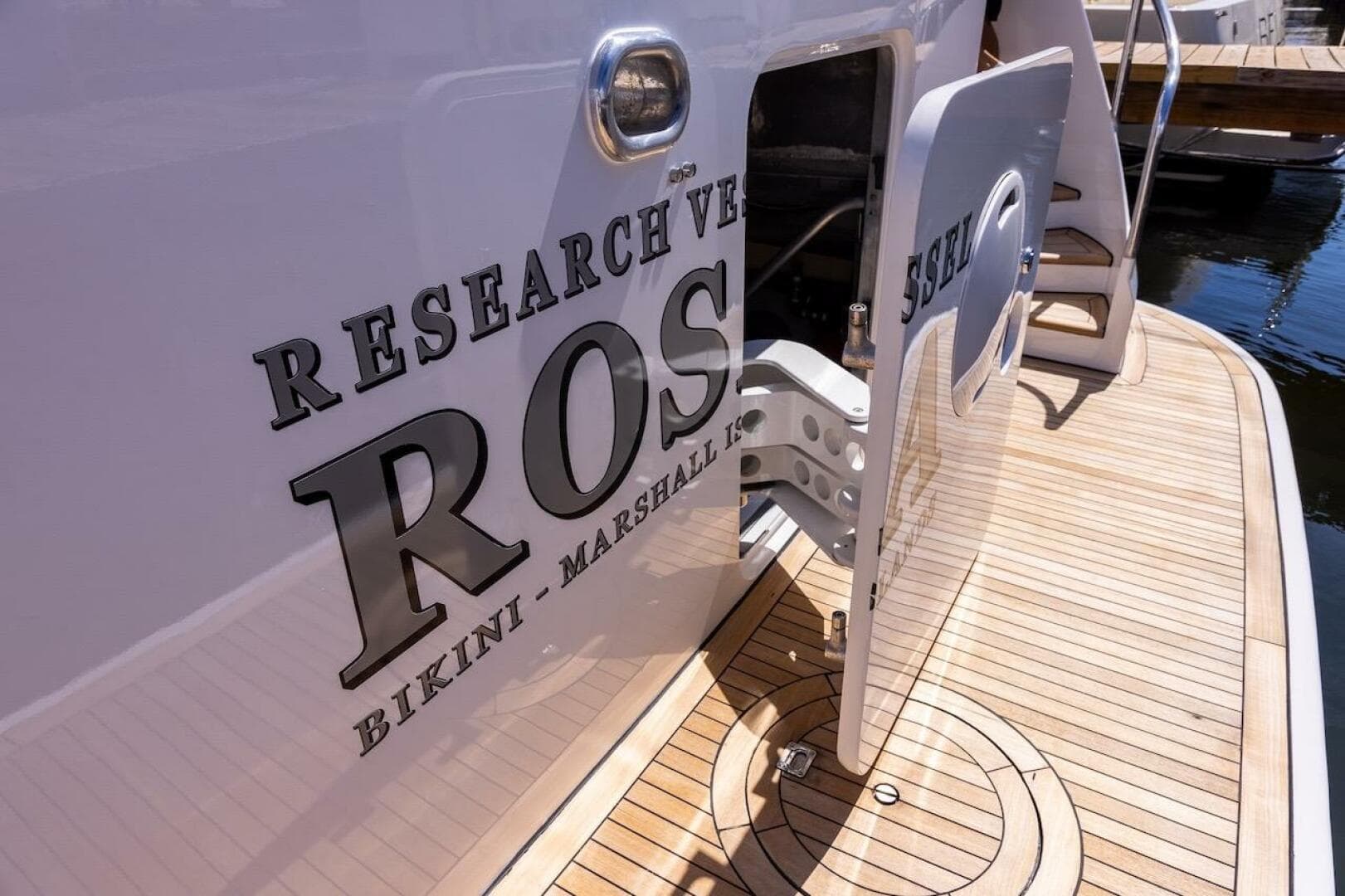 Research vessel docked, featuring "ROS" and "Bikini - Marshall Islands" on the hull.