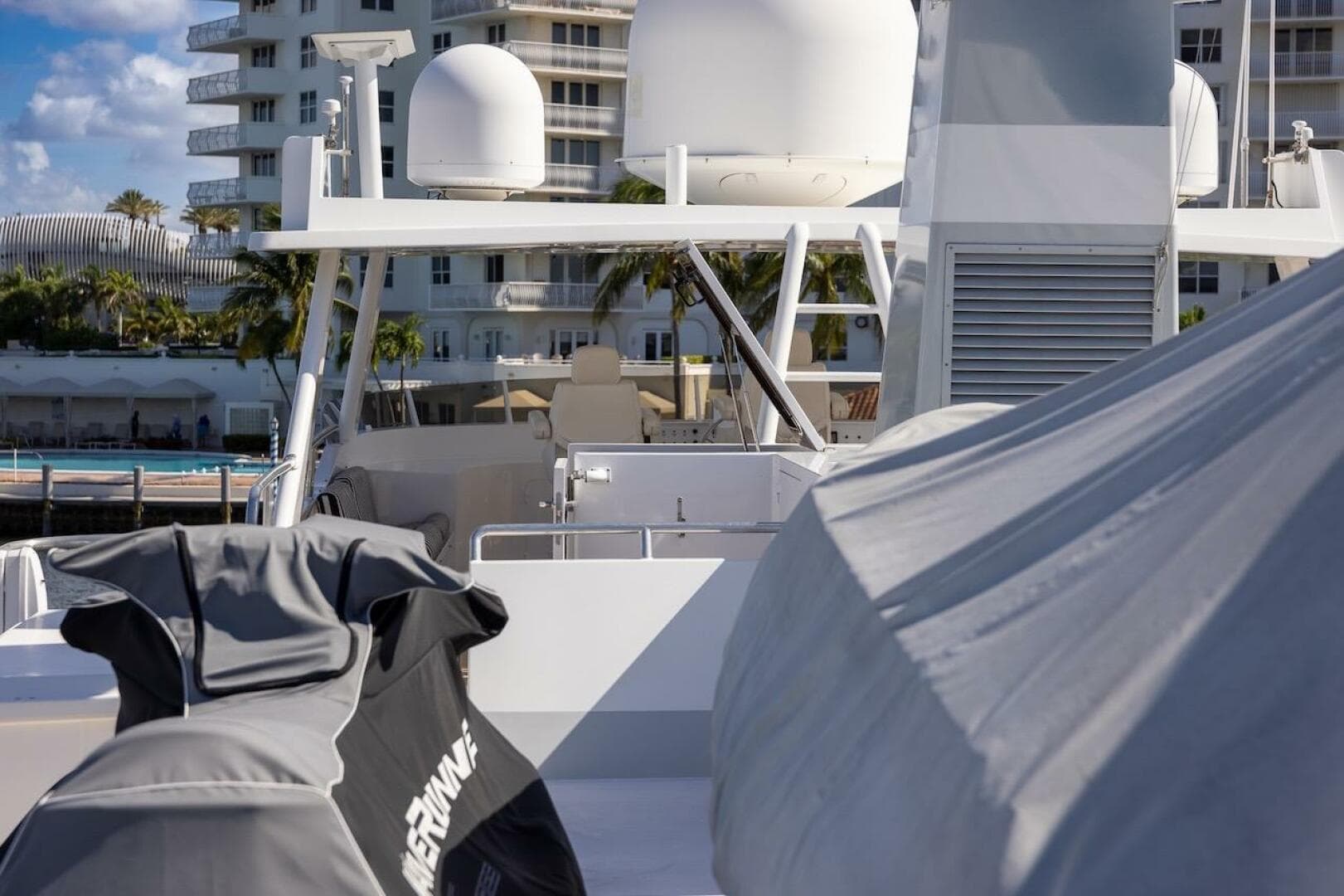 Luxury yacht deck with covered equipment, featuring the 1996 ABD 90 Explorer model.