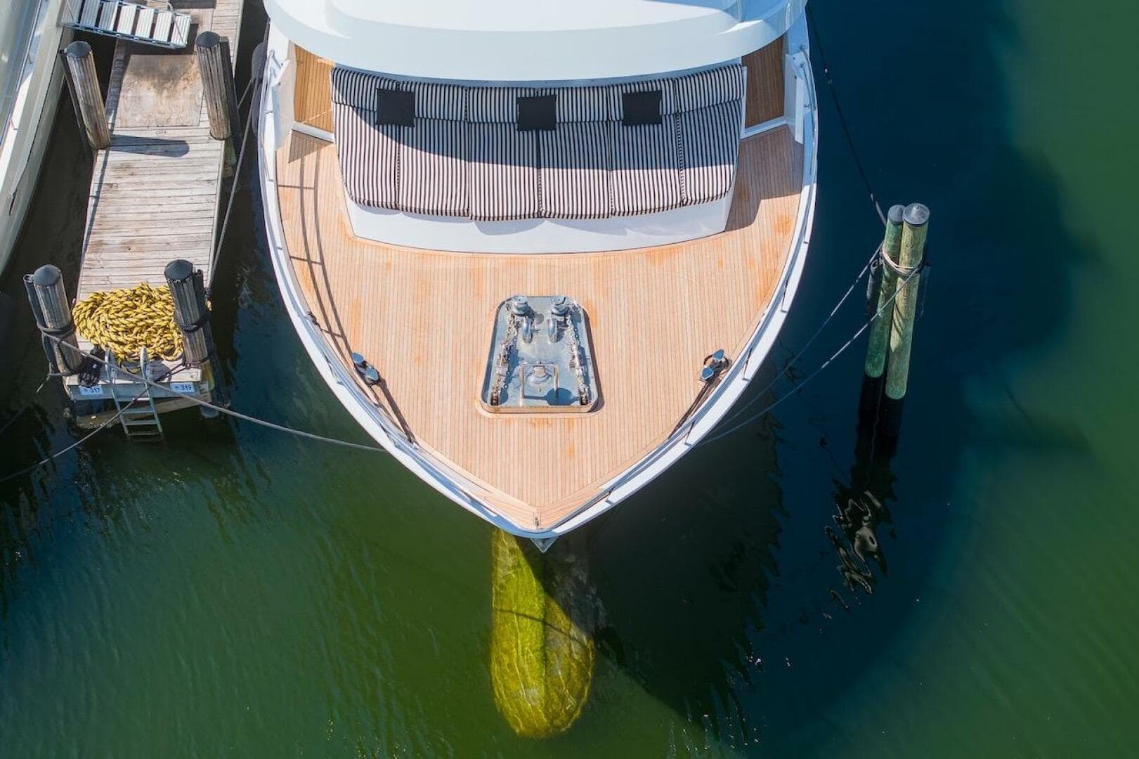 Aerial view of 1996 ABD 90 Explorer yacht docked at marina.