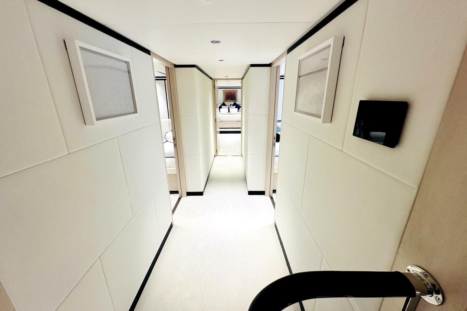 Luxurious hallway interior of 2023 Majesty 120 yacht, featuring modern design and elegant decor.