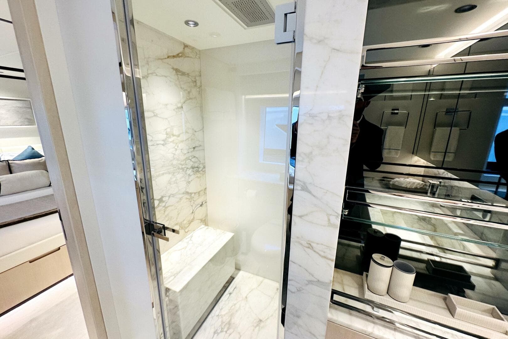 Luxurious marble bathroom interior on 2023 Majesty 120 yacht.