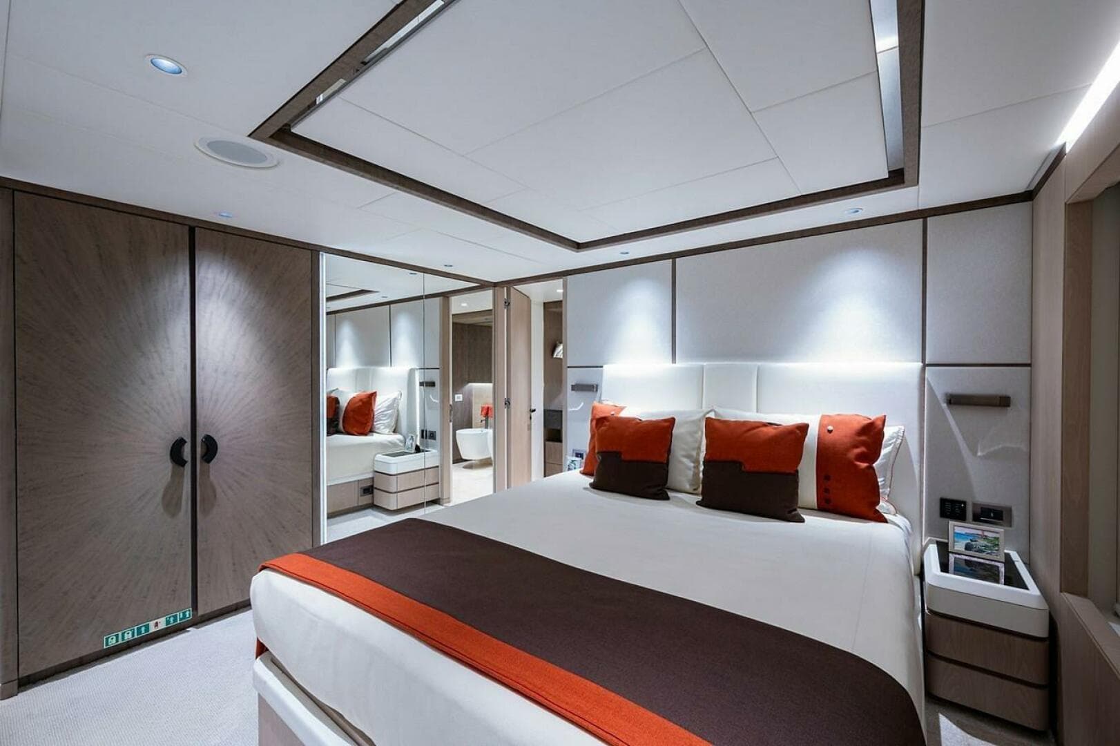 Luxurious bedroom interior on 2020 Majesty 140 yacht with modern design and elegant decor.