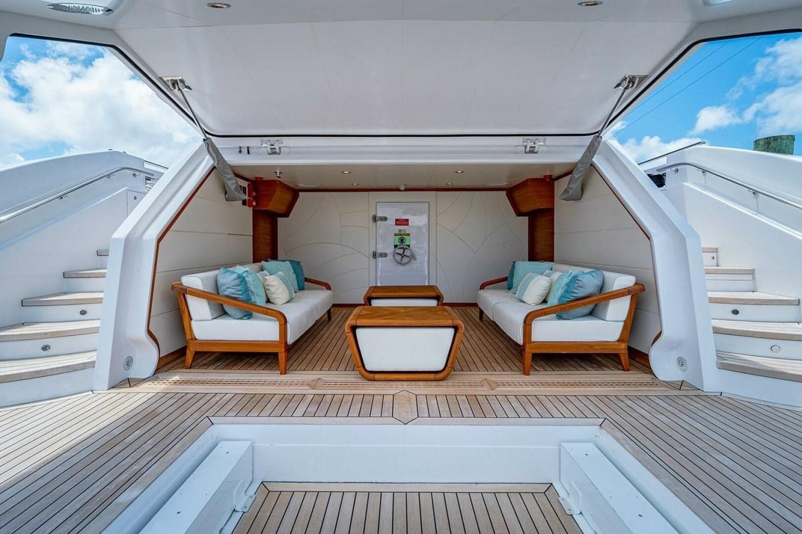 Luxurious 2020 Majesty 140 yacht interior with elegant seating and wooden accents.