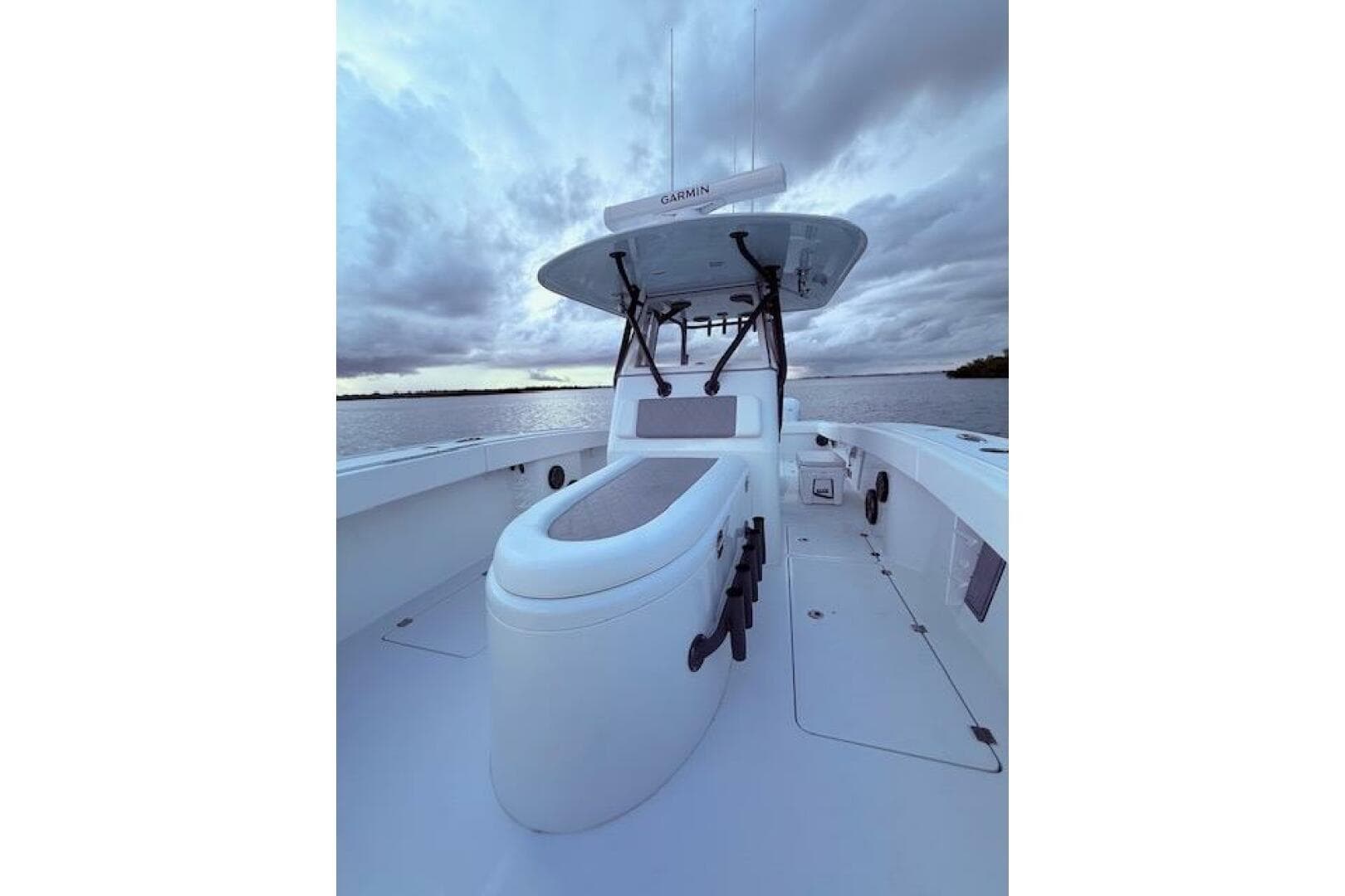 2019 Freeman 34 boat on water under cloudy sky, featuring sleek design and modern equipment.