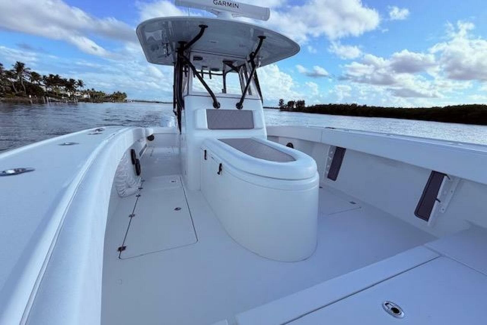 2019 Freeman 34 boat with spacious deck, sleek design, and clear blue sky backdrop.