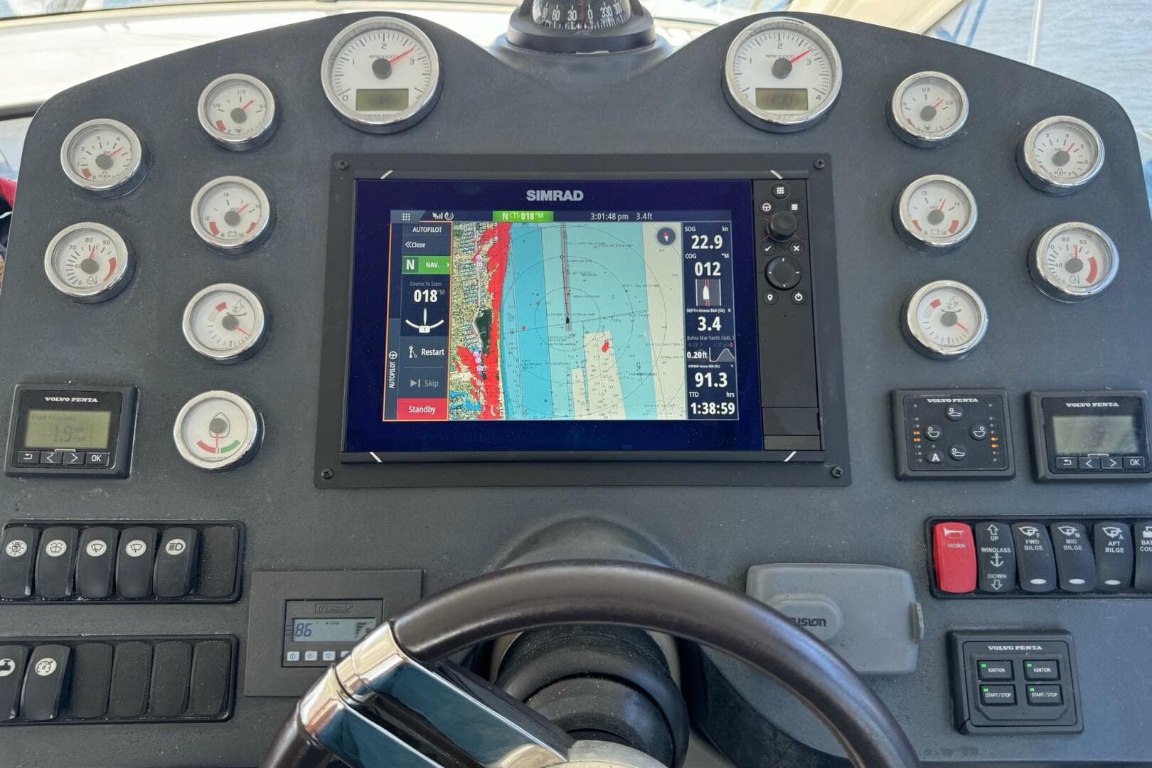 Dashboard of 2014 Beneteau Gran Turismo 44 with navigation and control instruments.