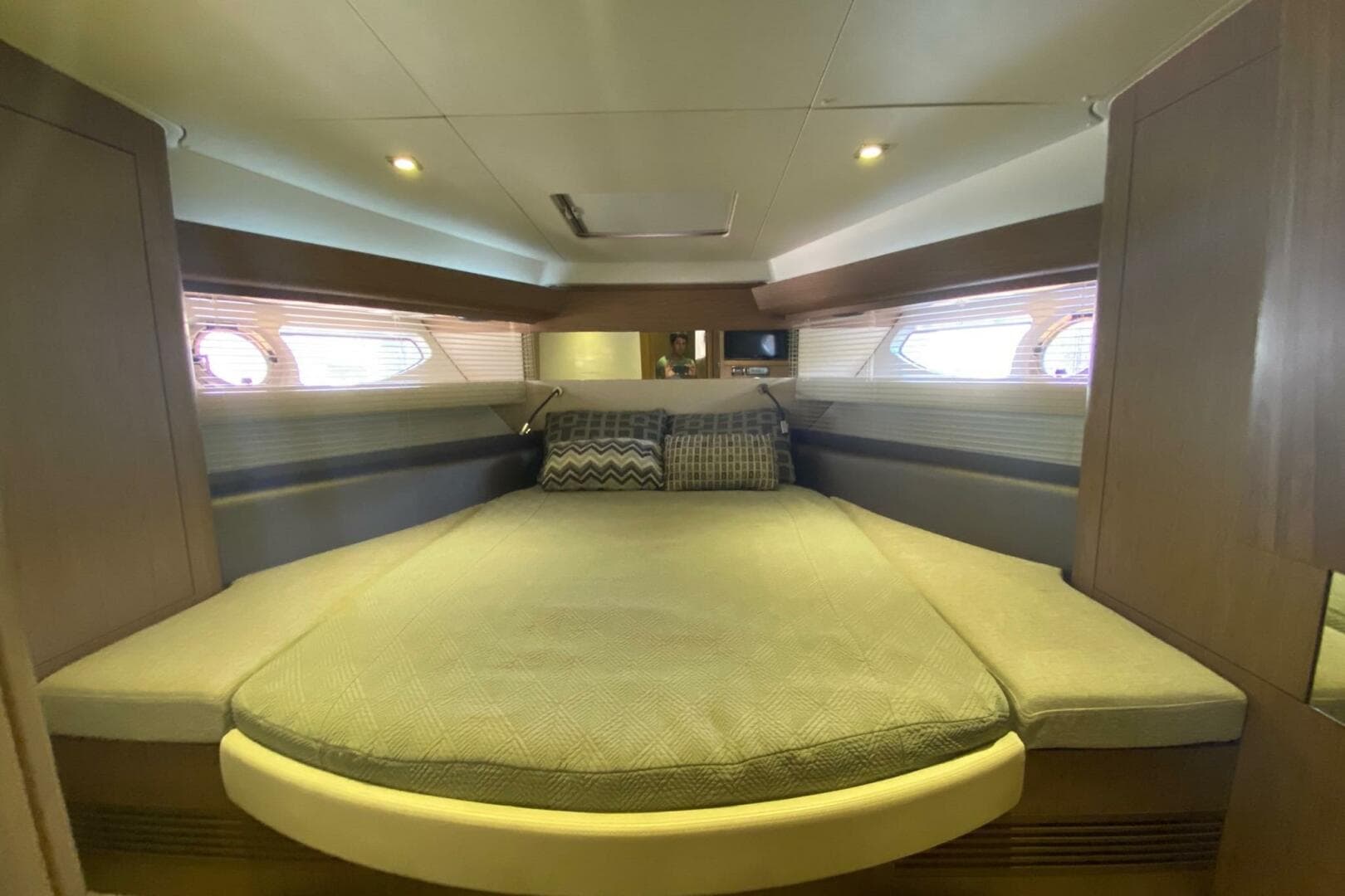Luxurious cabin interior of 2014 Beneteau Gran Turismo 44 yacht with cozy bedding.