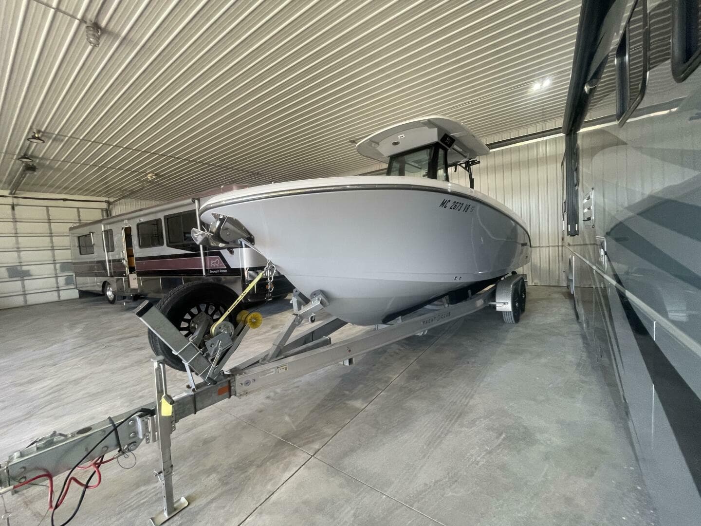 Front View of Stingray Center Console Boat in Storage Facility