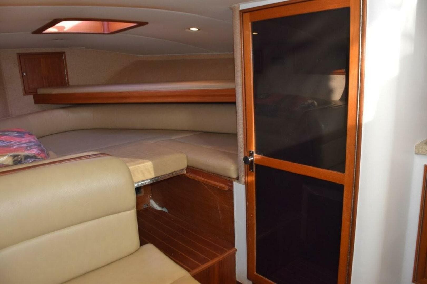 Portside Door To Head Compartment. Forward Quarter Berth And Overhead Hatch