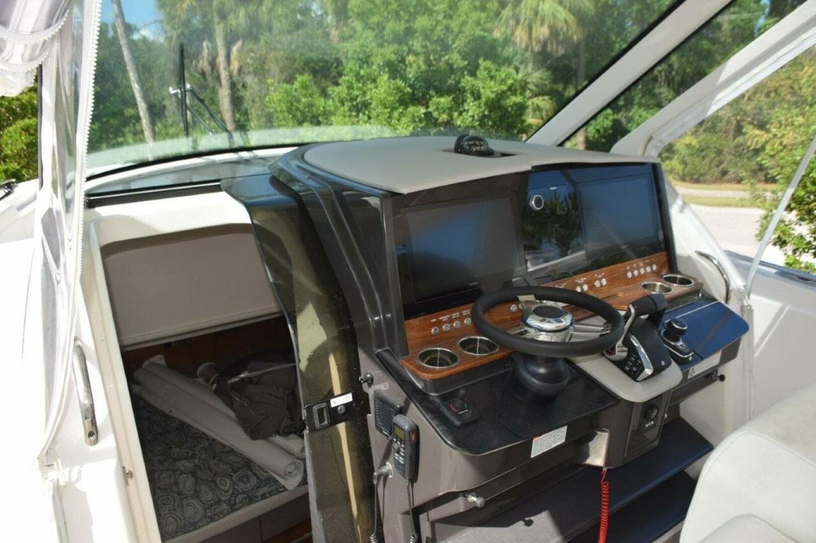 Helm With Dual Garmin 8616 Nav Screens, Bow Thruster, Fusion Stereo. RGB Lighting Control