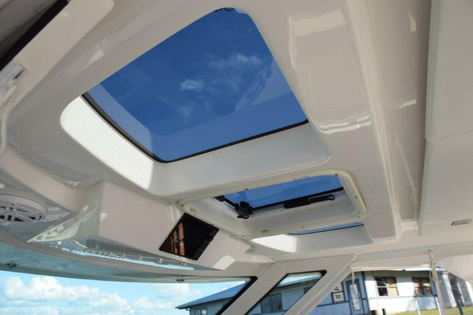 Opening Skylights Overhead Of Helm. Engine Data Screen In Overhead Panel