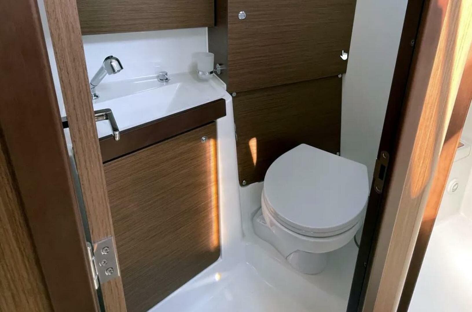 Head with toilet and sink