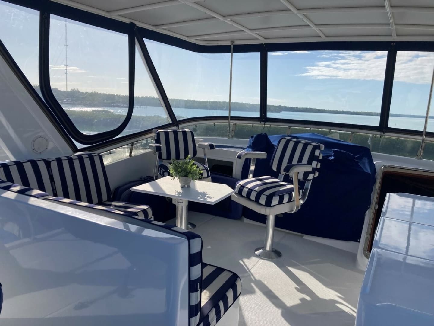 Flybridge Seating And Hatch Open To Stairs Down To Pilothouse
