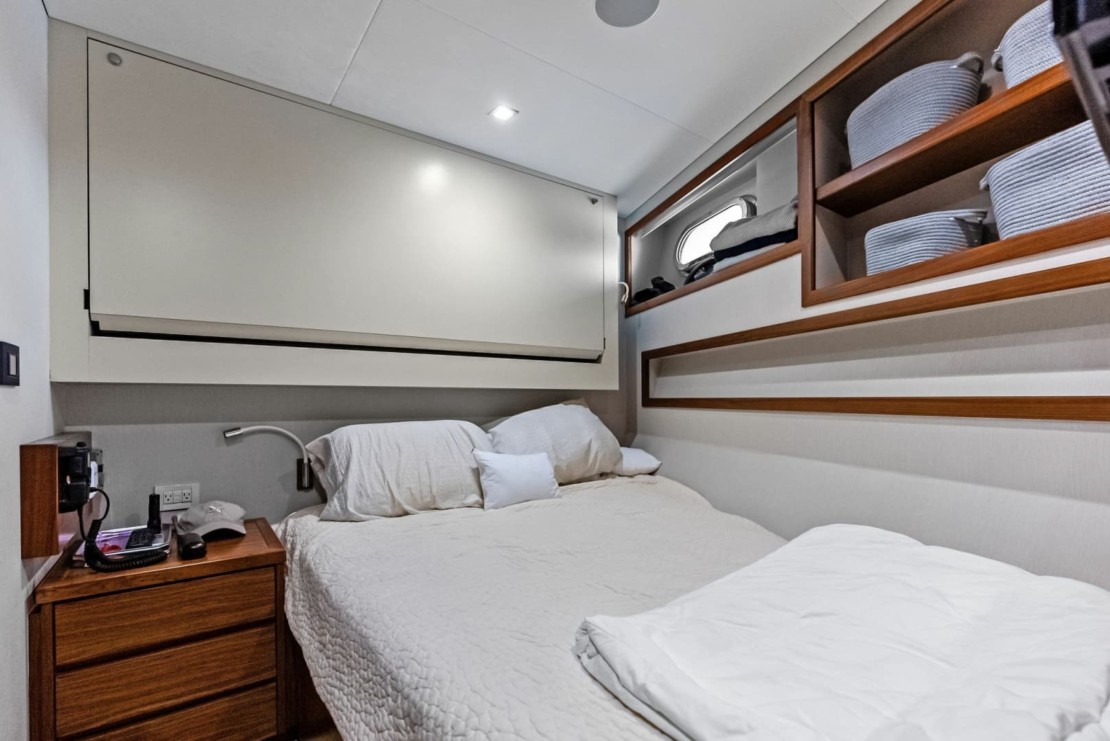 Crew cabin #2, portside with overhead pullman berth
