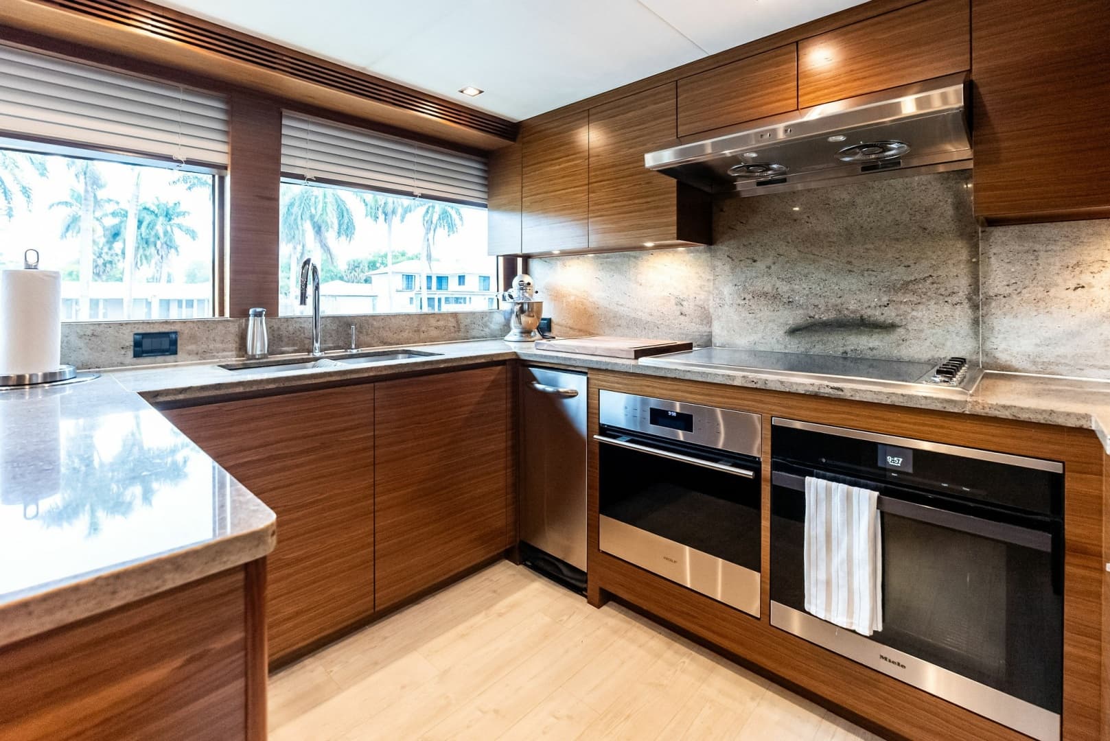 Galley, chef's station, dual ovens, cooktop and vent hood