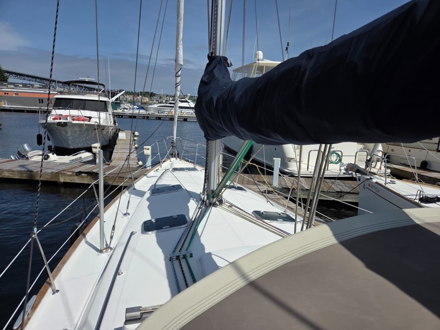 Beneteau Oceanis 411 sailboat docked at Signature, showcasing deck and rigging
