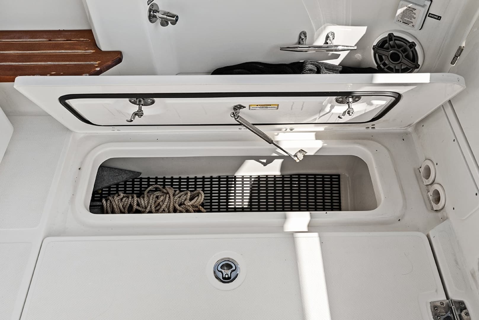 Stbd cockpit sole built-in storage