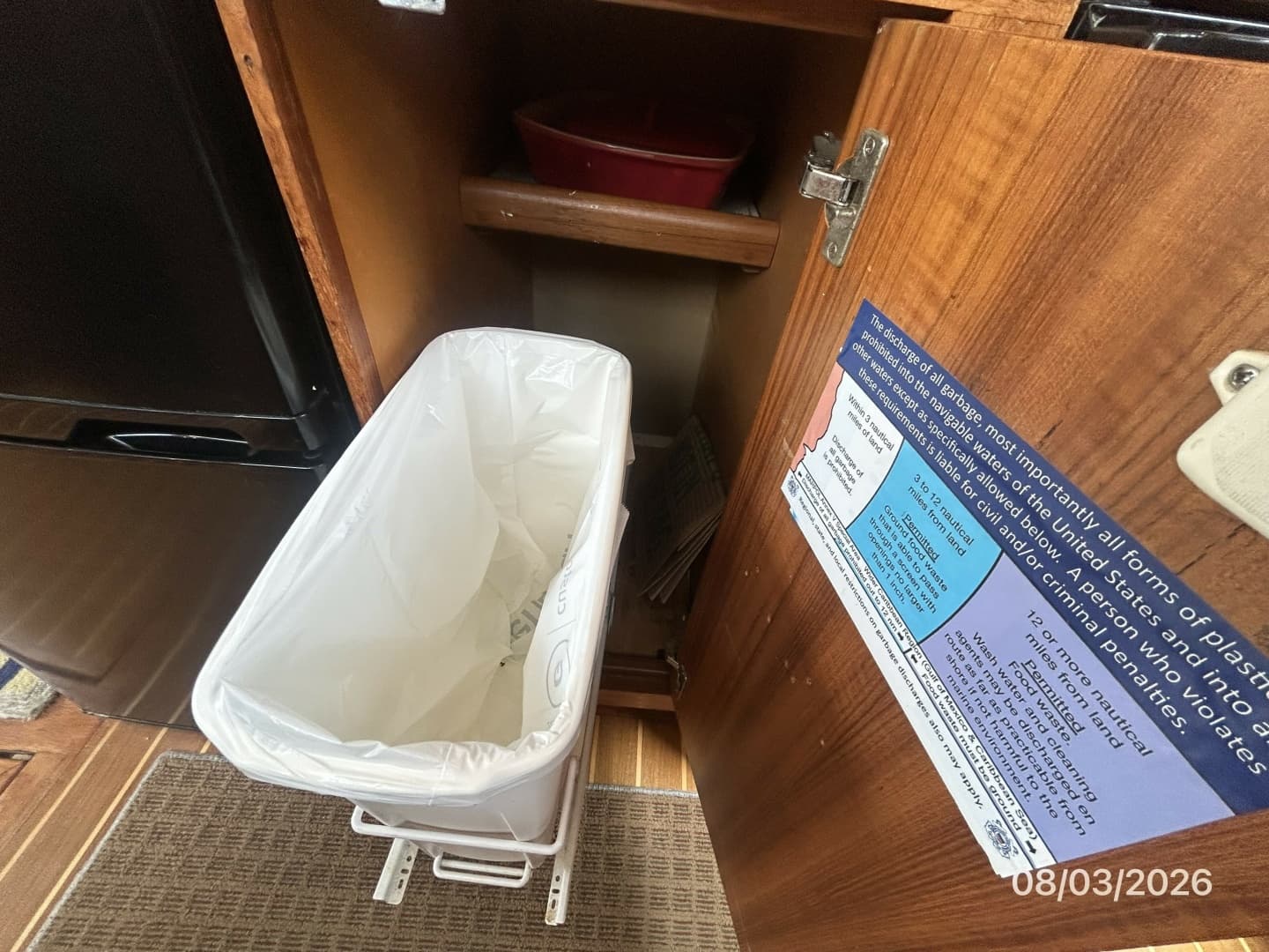 43' Mainship galley trash compartment