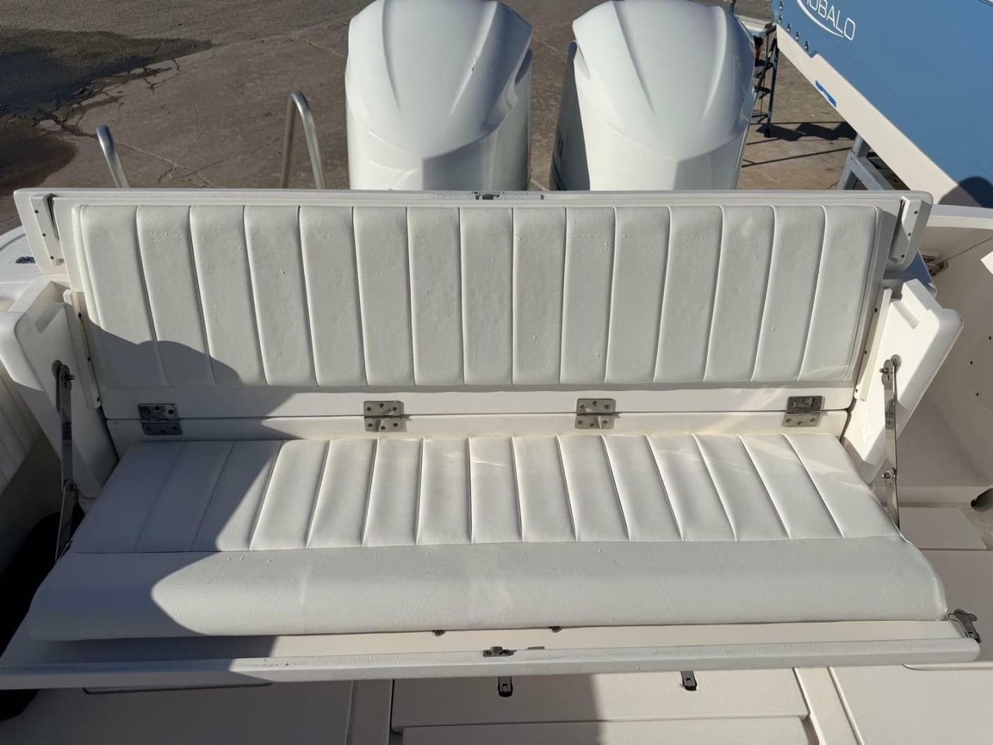 2017 Intrepid 327 Center Console for sale in Pompano Beach FL - transom bench seat folded up exposing rear storage