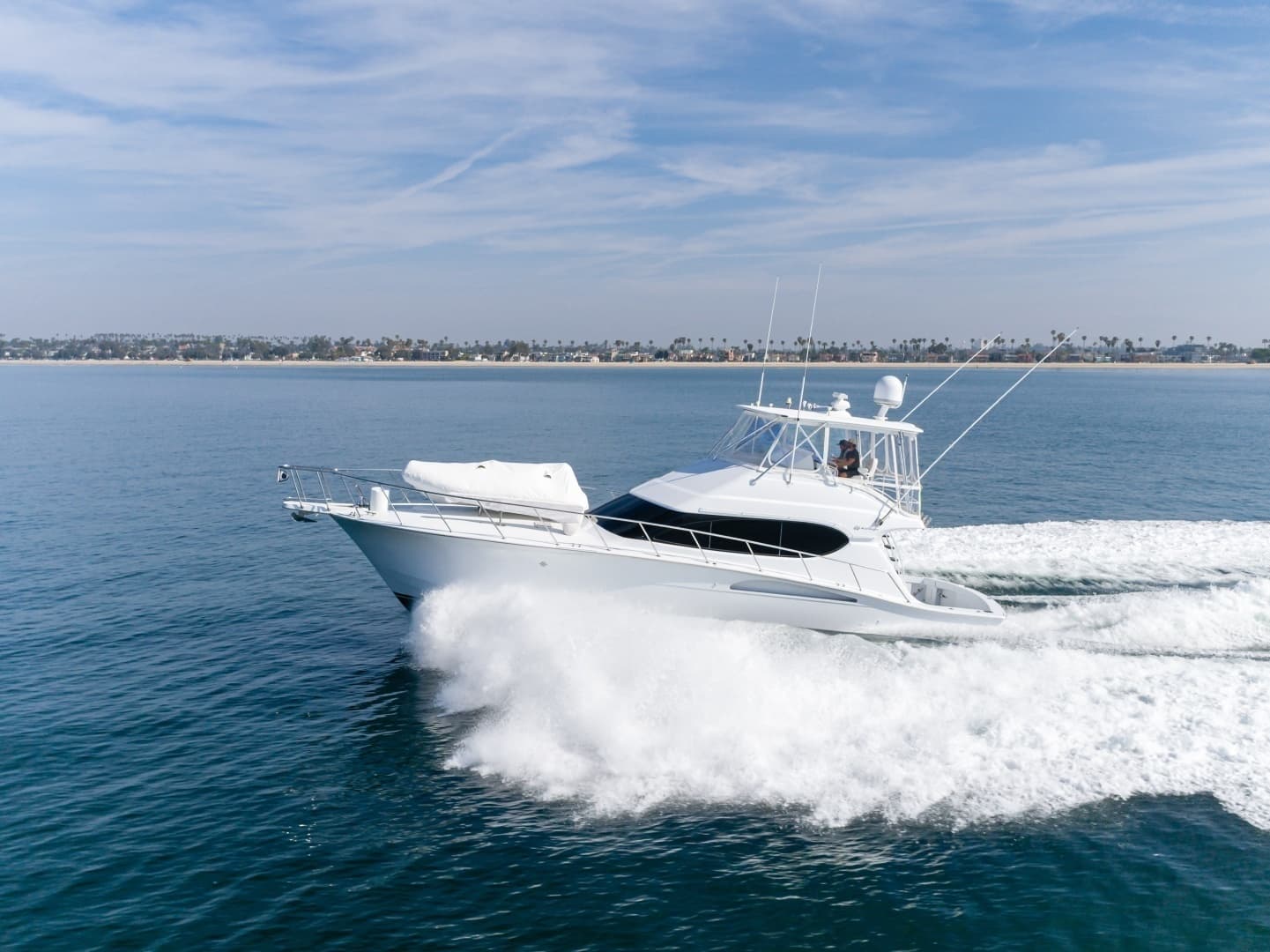 2003 Hatteras 54 Convertible - "BRAINWAVE": Dynamic Port Side View at Sea