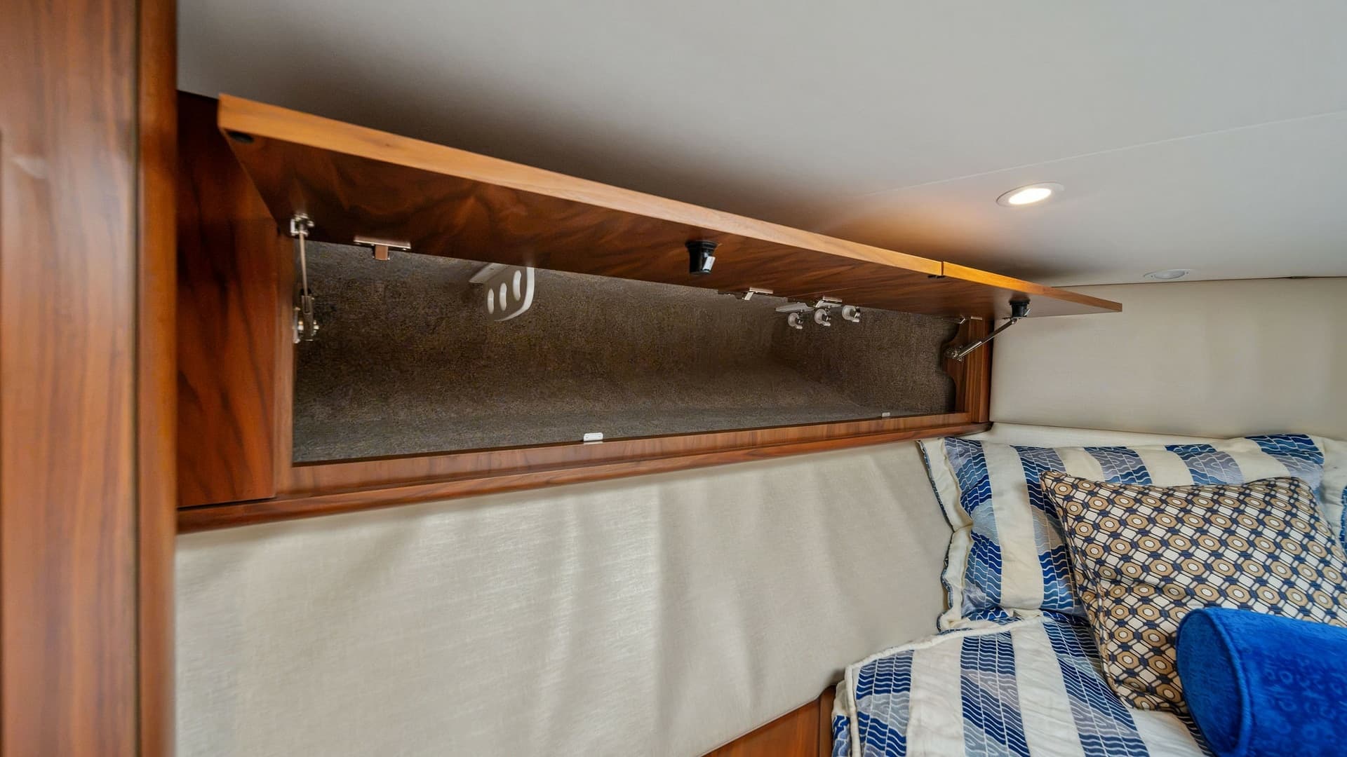 Cabin Overhead Storage and Bedding