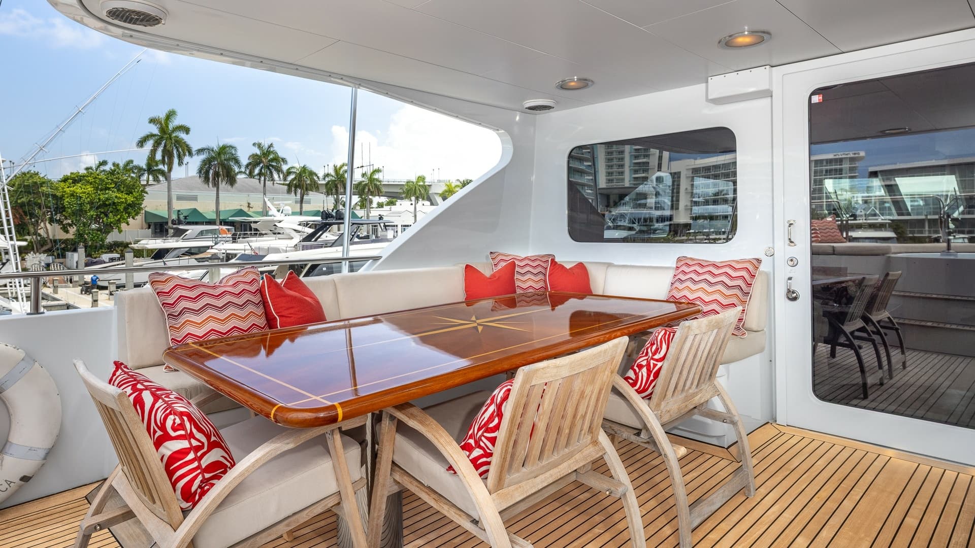 1998 Trinity Yachts Sport Fisherman - BAD COMPANY: Aft Deck with Dining Area
