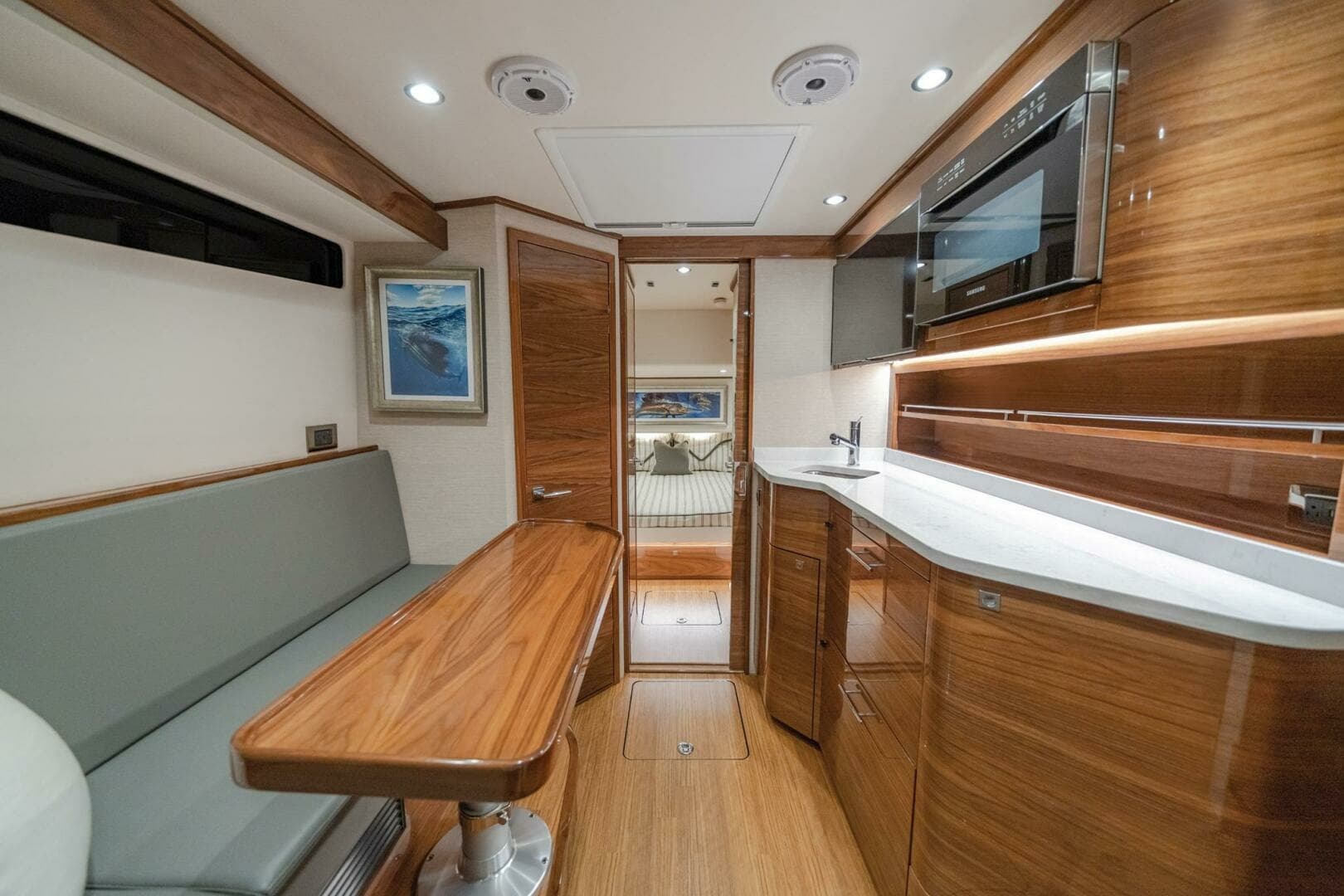  2024 Valhalla Boatworks V-55 "MAVERICK" - Elegant Galley & Dining Salon with Rich Wood Finishes & Modern Amenities