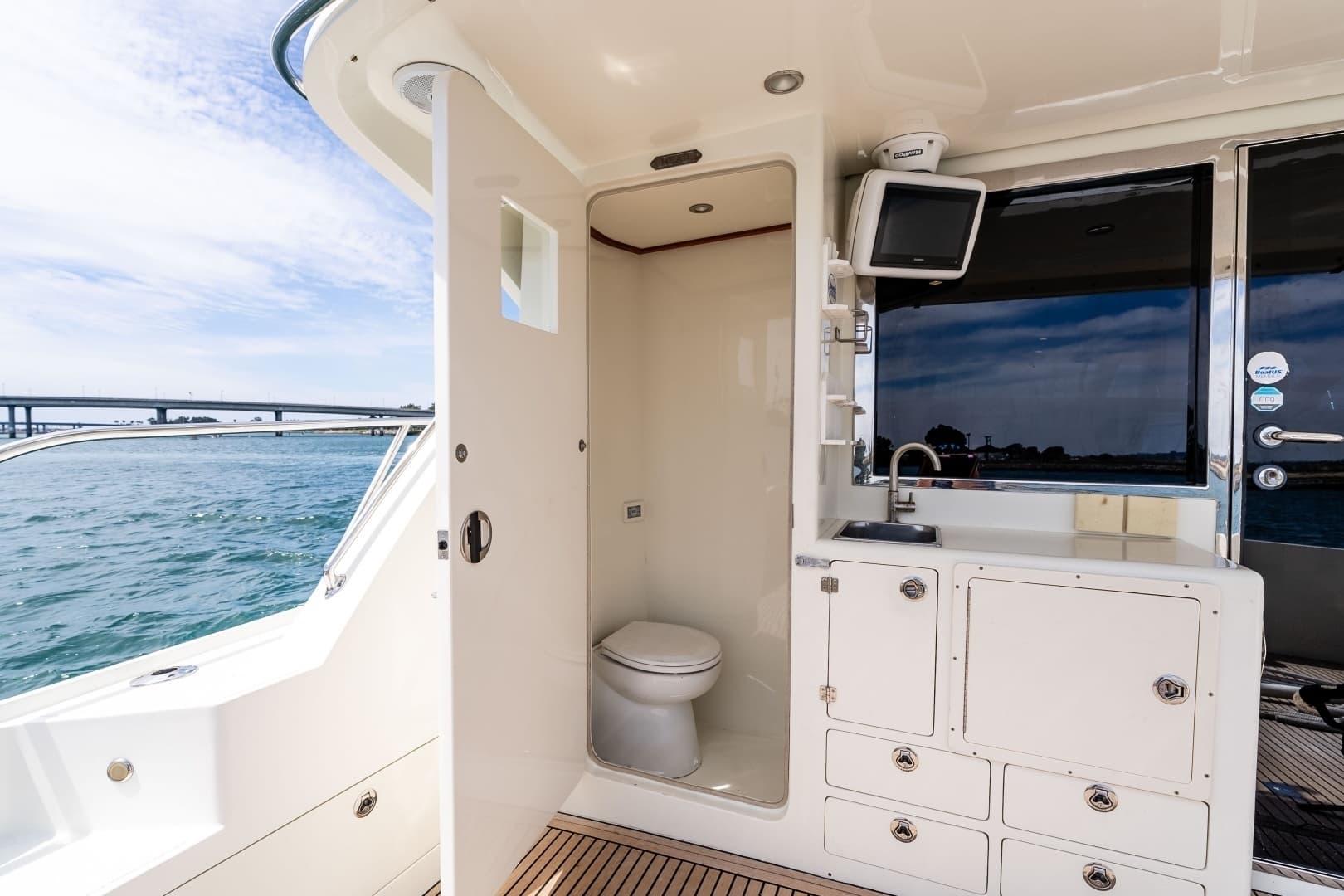 2019 Mikelson 50 Sportfisher "Miss B Haven" - Cockpit with Outdoor Head and Sink