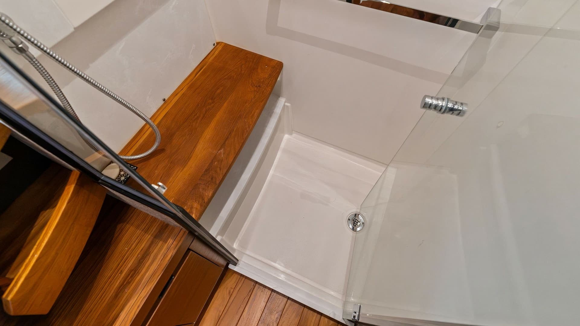 Modern Shower with Teak Accents
