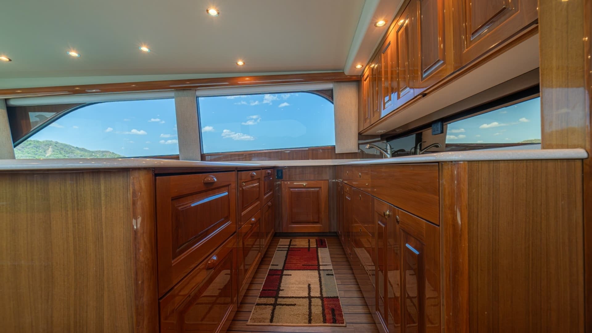 Galley with Rich Wood Cabinetry